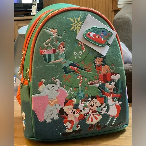 Disney: Loungefly Classic Christmas glow in the dark mini backpack green &orange - Picture 1 of 9